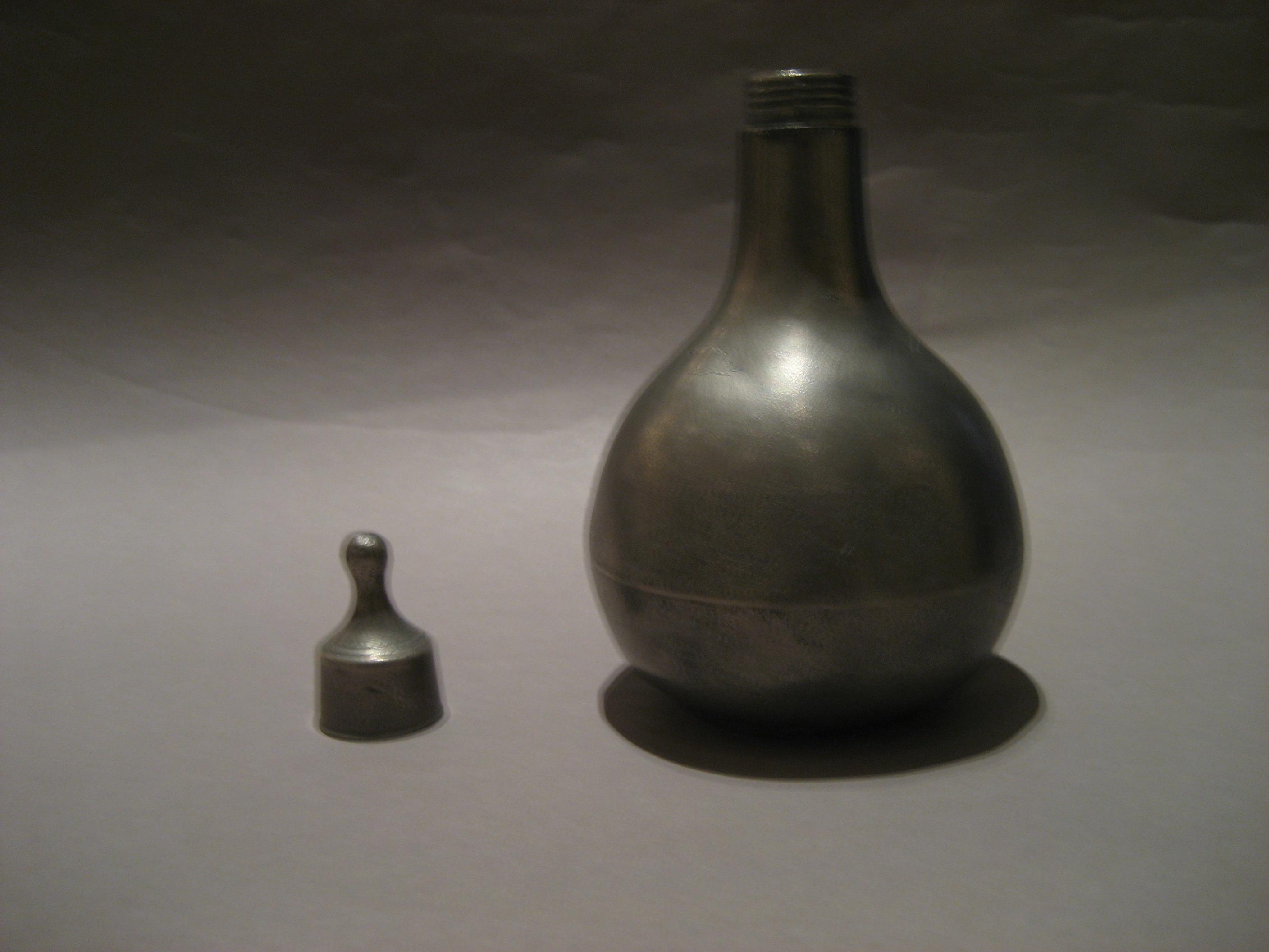 1965.1469 Pewter Nursing Bottle (with lid off)