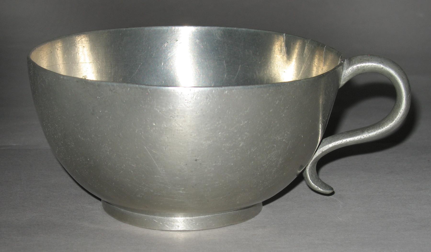 1965.1527 A Pewter teacup