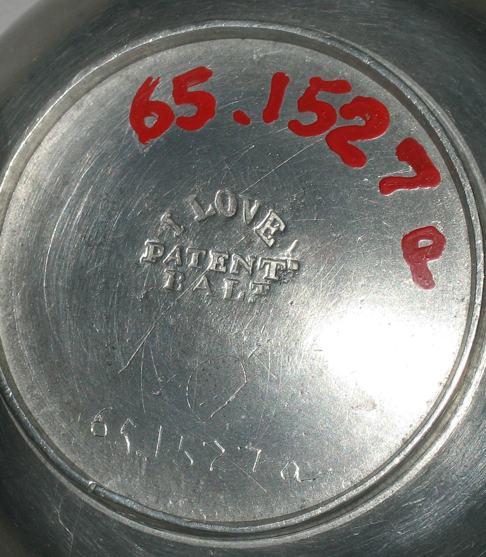 1965.1527 A Pewter teacup (marks)