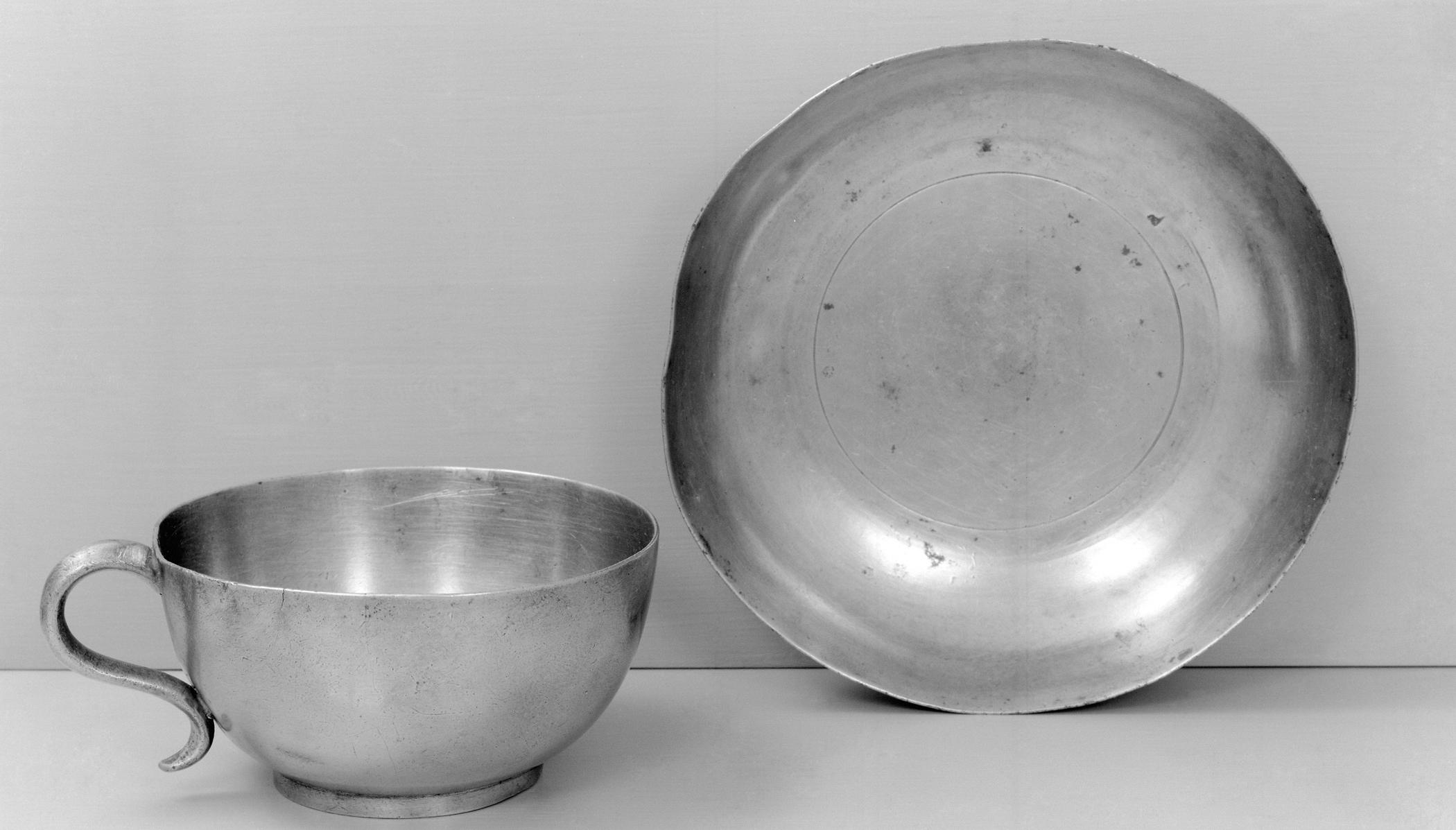 1965.1527 A, B Pewter teacup and saucer (view 2)