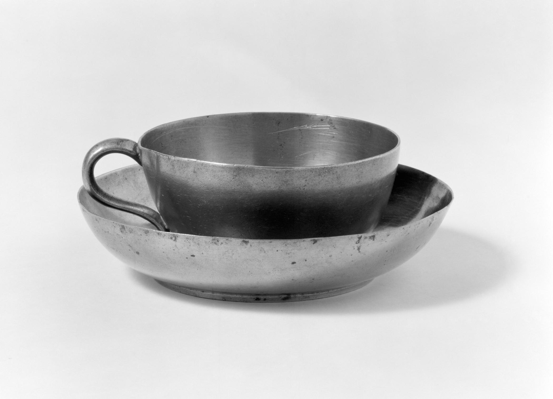 1965.1527 A, B Pewter teacup and saucer