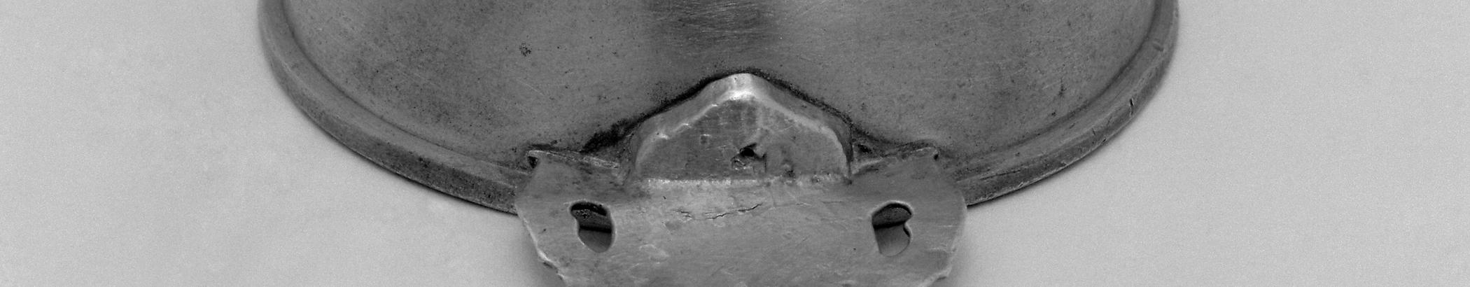 1965.1530 Pewter porringer (detail)