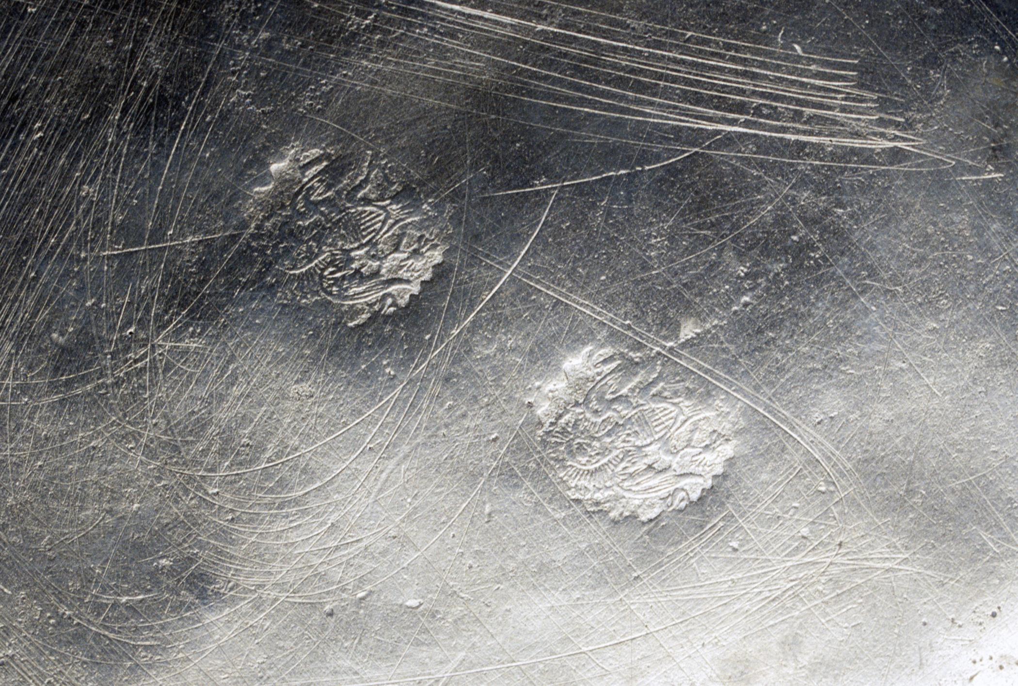 1965.1544 Pewter plate (marks)