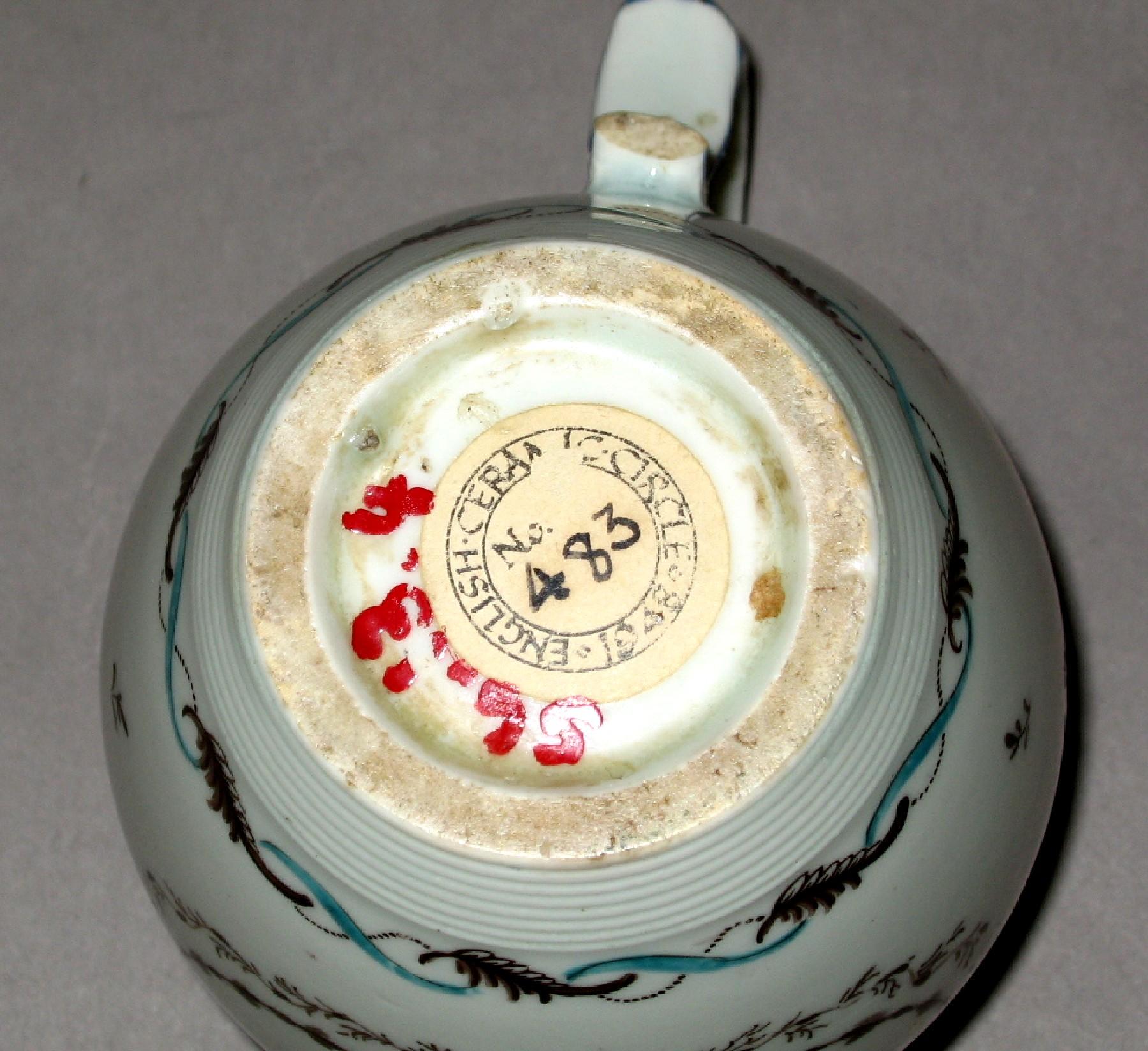 1956.0013.004 Lowestoft porcelain mug (underside)