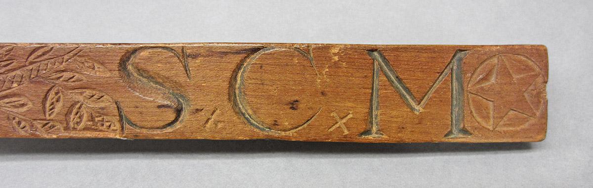 1965.1820, Butter mold, handle carving detail 2