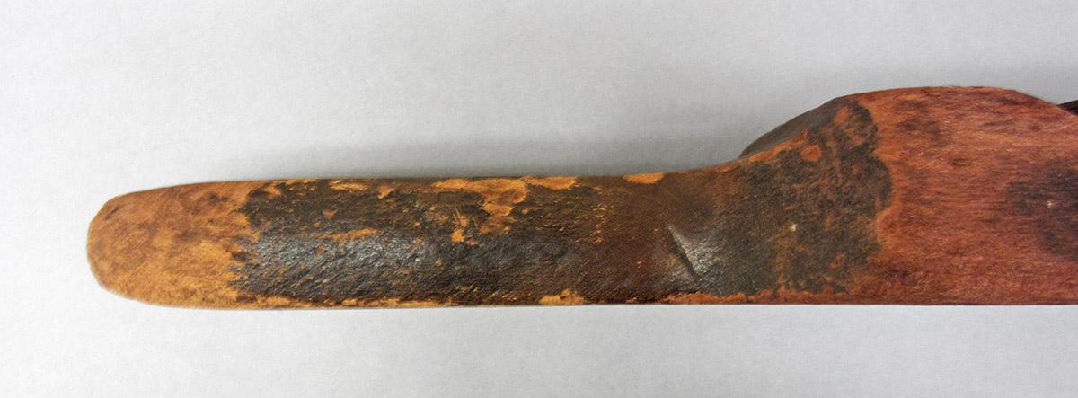 1965.1853, Scrubbing stick, handle side 2