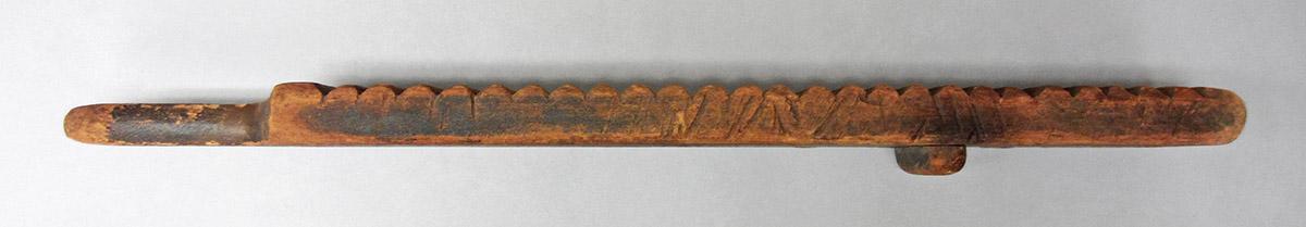 1965.1853, Scrubbing stick, side 1