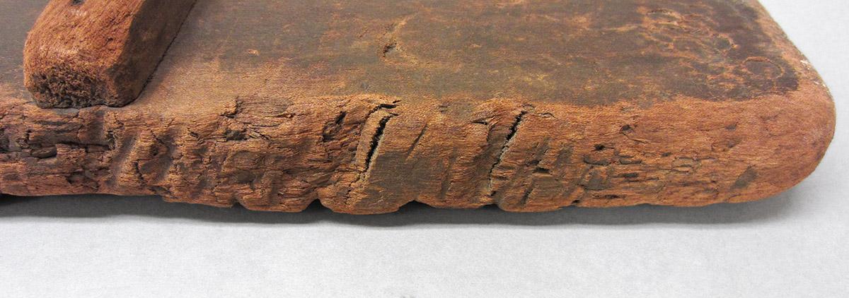 1965.1853, Scrubbing stick, side detail