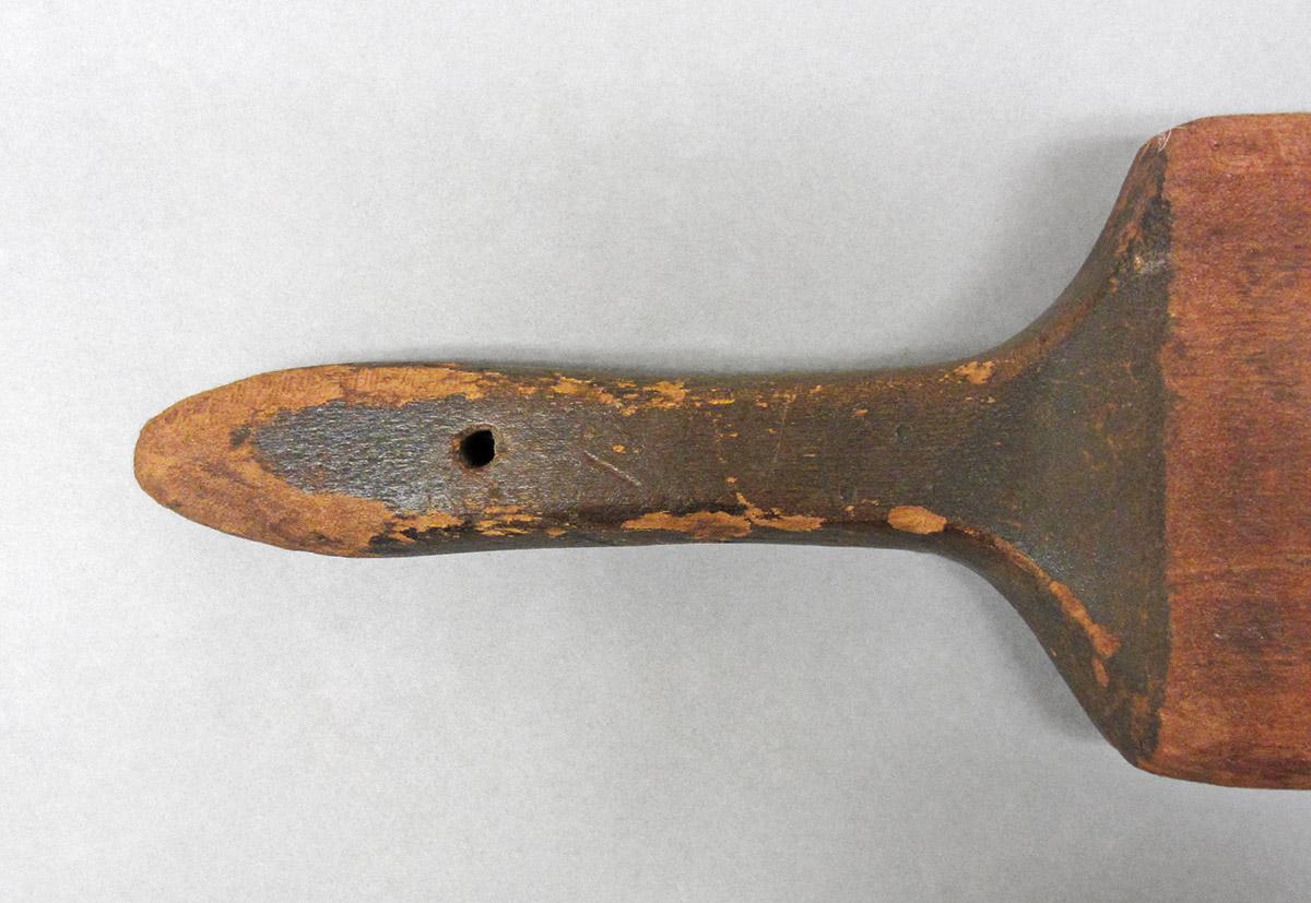 1965.1853, Scrubbing stick, handle side 1