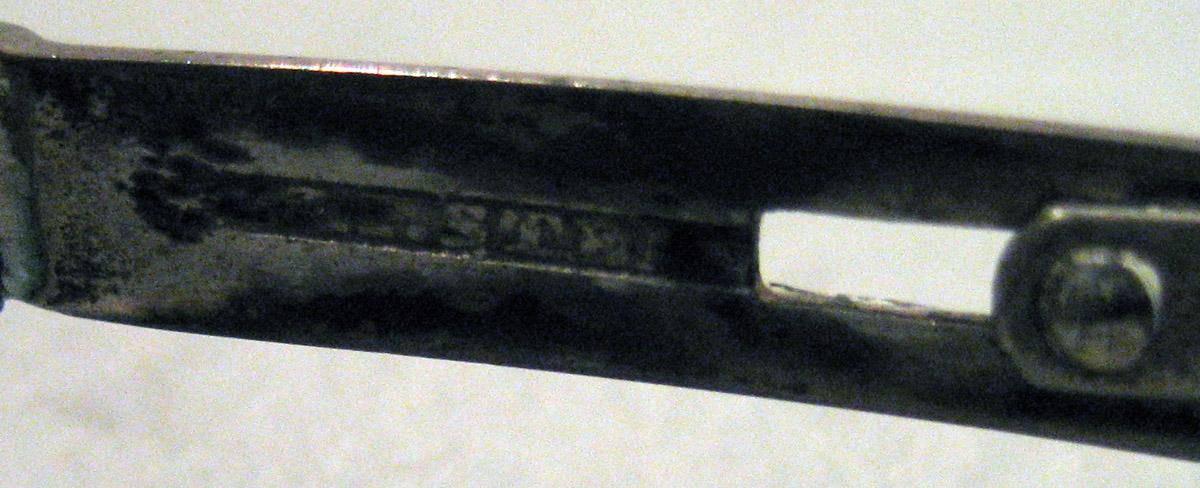 1965.2061 Silver Spectacles mark