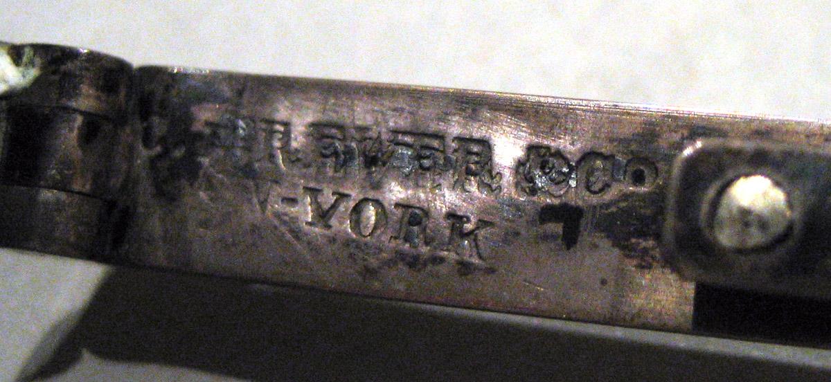 1965.2062 Silver Spectacles mark