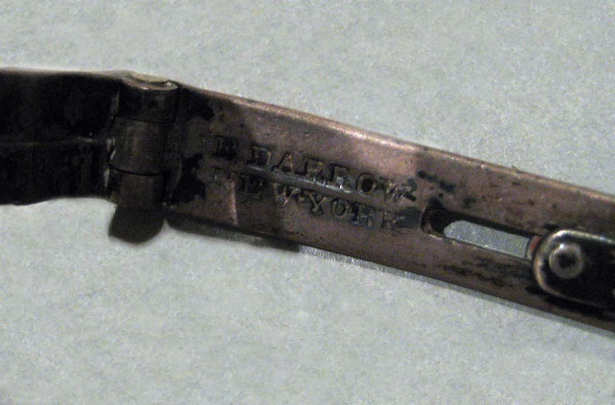 1965.2064 Silver Spectacles mark