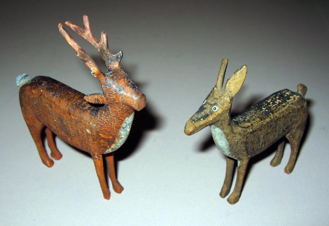1965.2107.061-.062 Buck and animal
