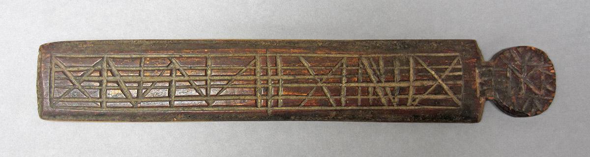 1965.2139 A,B, Razor box with strop, lid carving