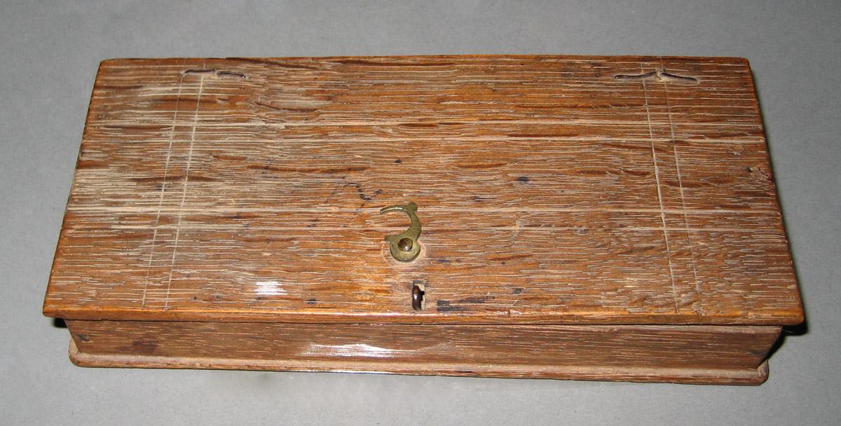 1965.2143 A-F Weight (detail)