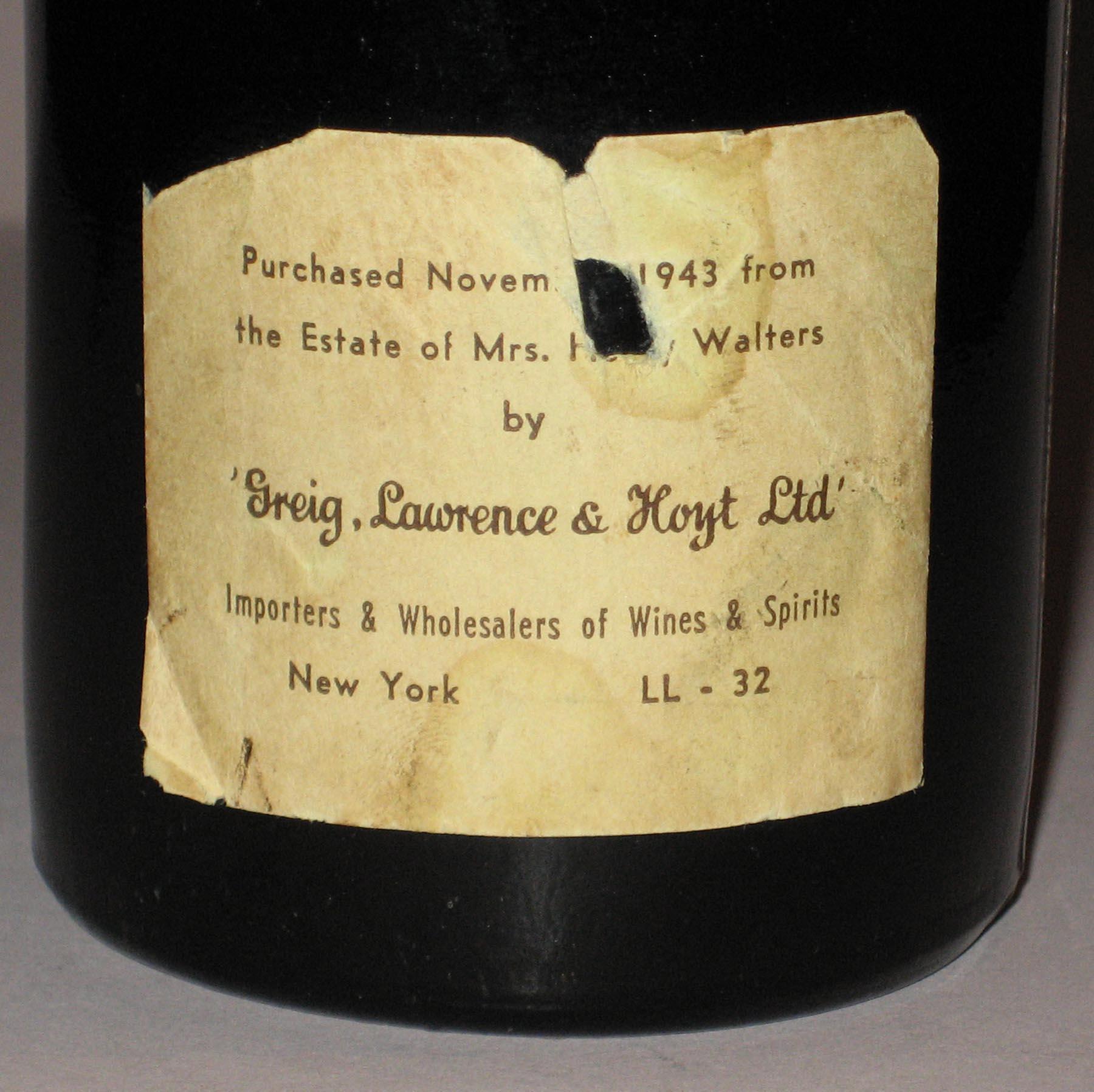 1965.2233 Whiskey or wine bottle (label 2)