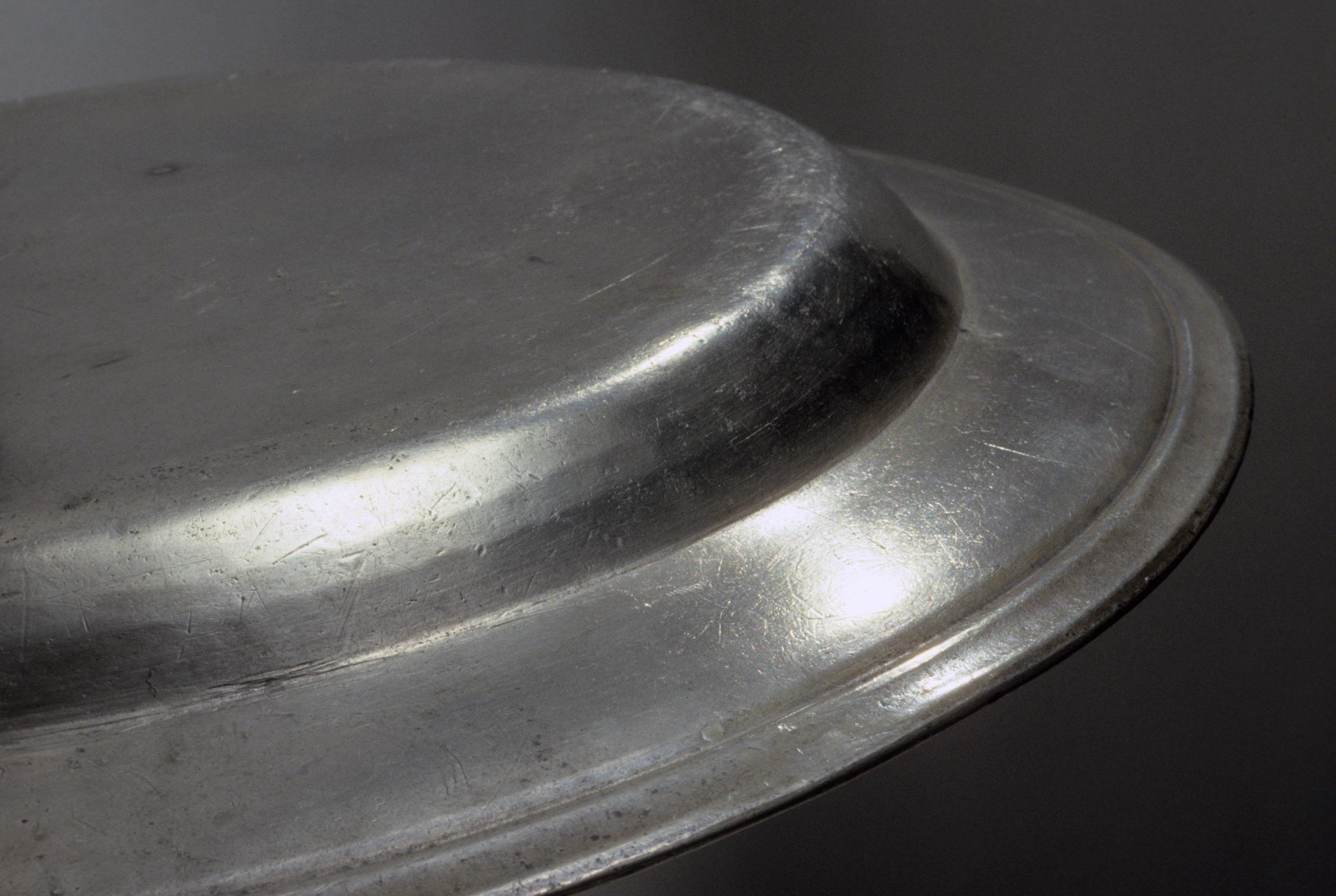 1965.2239 Pewter dish (detail)