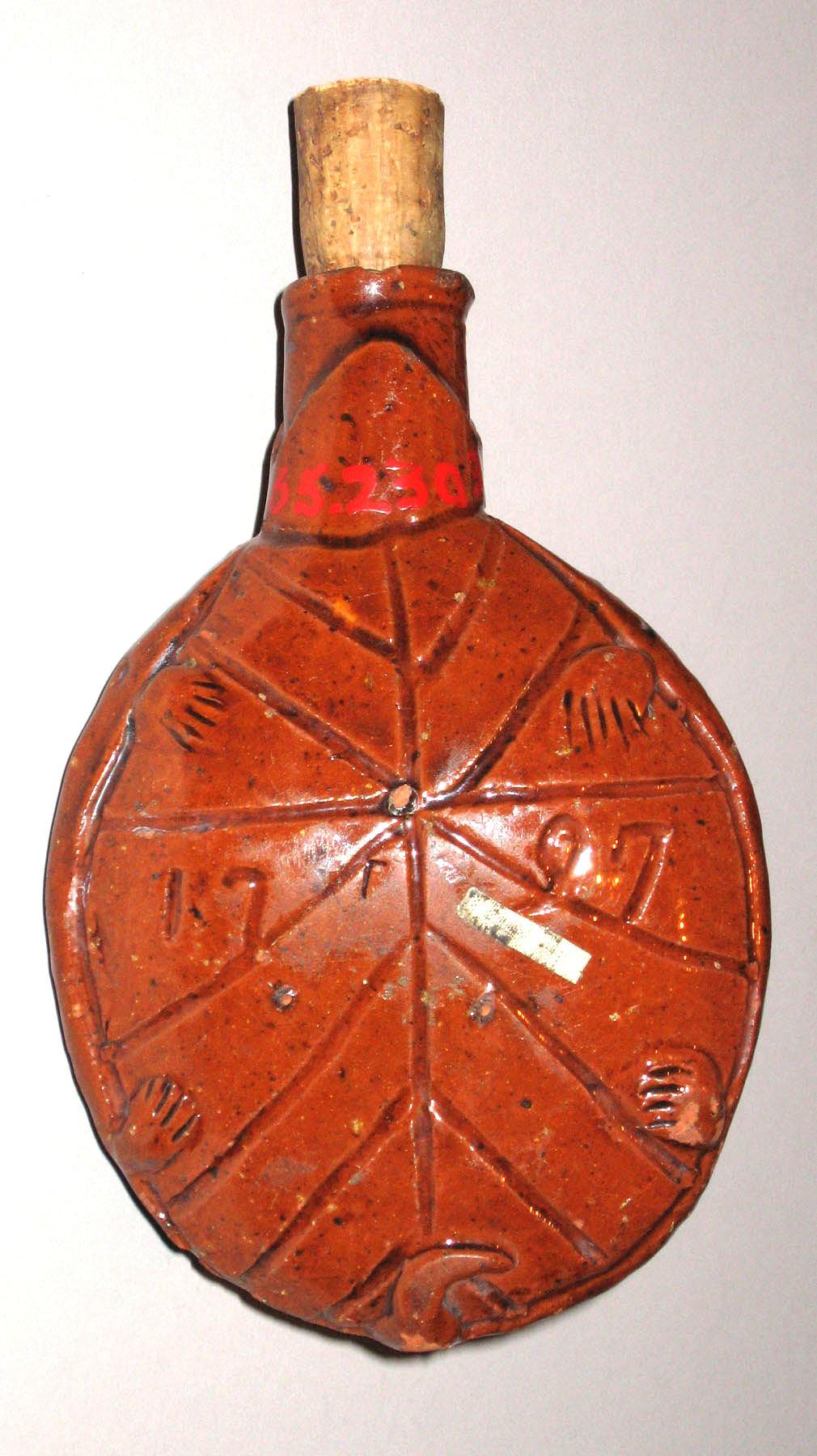 1960.2309 Redware 1797 turtle flask (inscript)