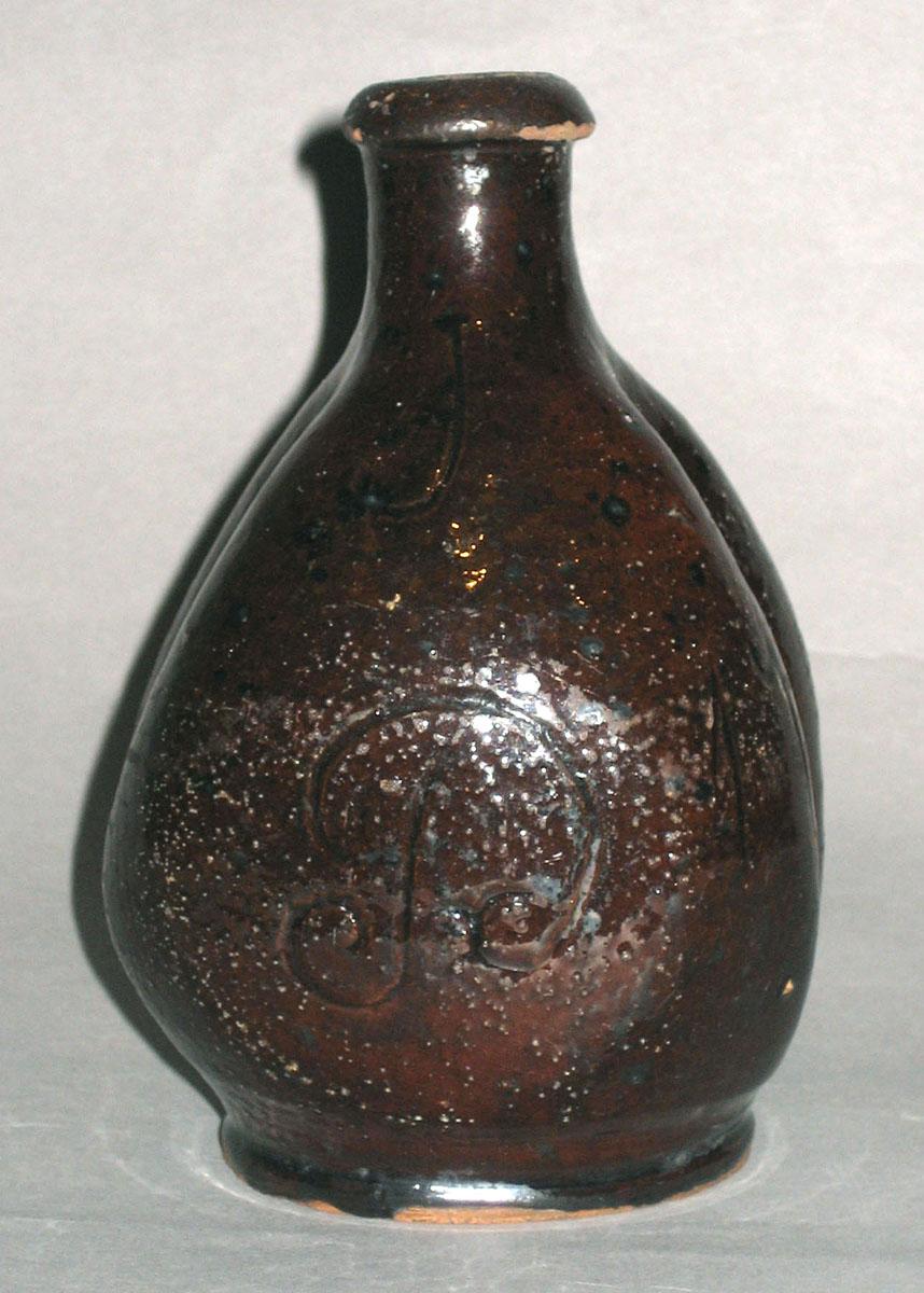 1965.2310 (side 1) Bottle
