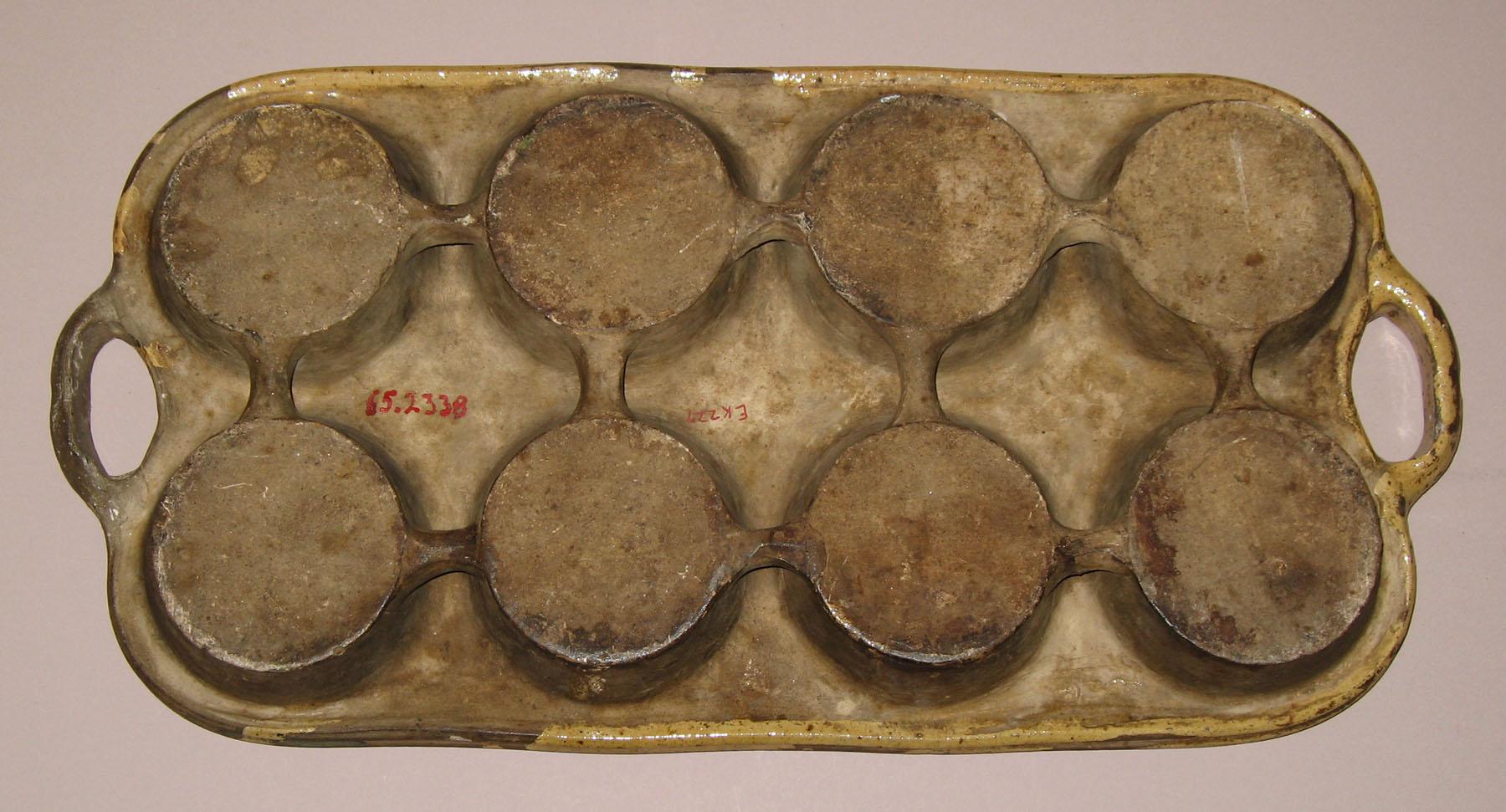 1965.2338 Earthenware (Slipware) muffin pan (bottom)