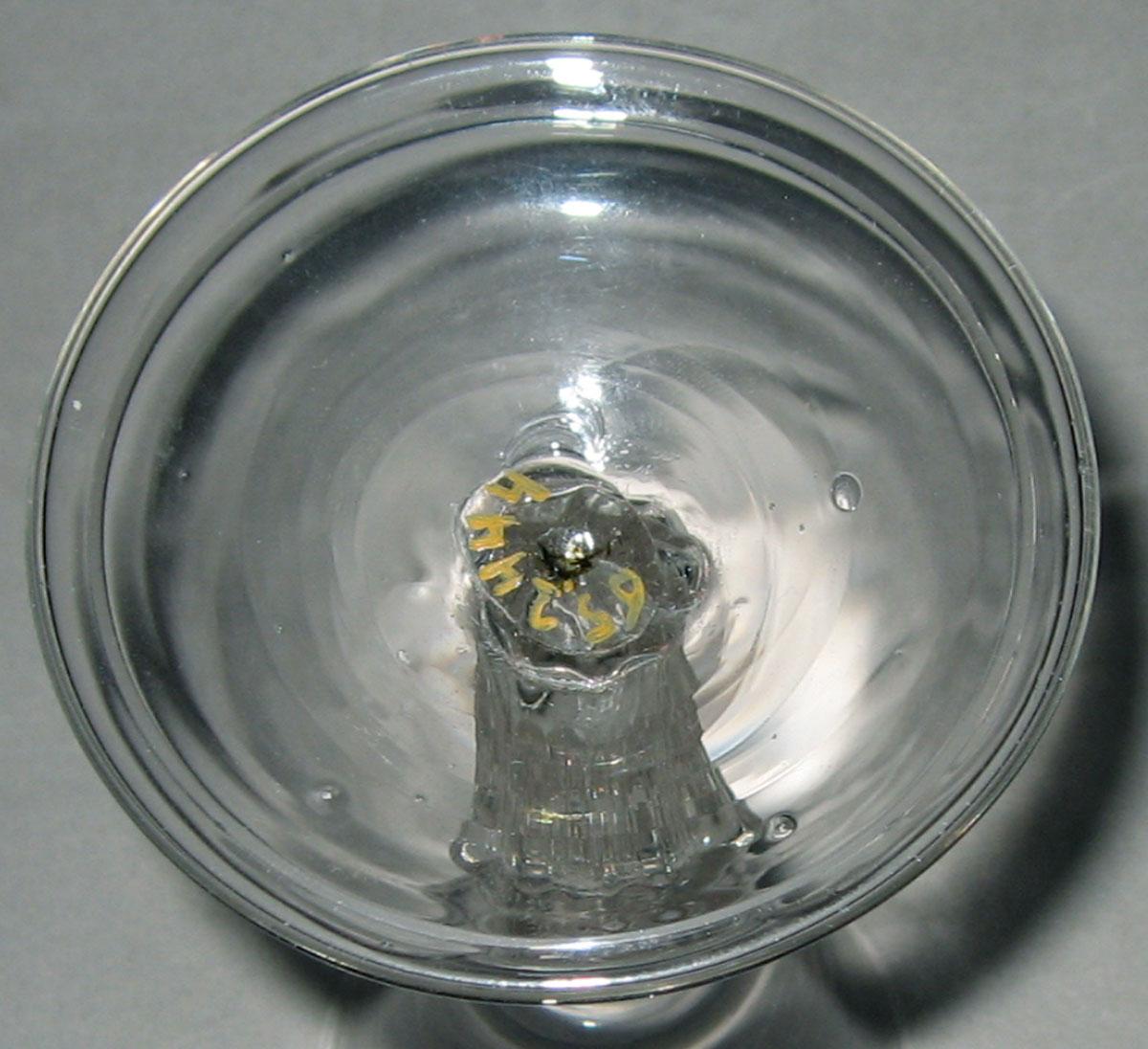 1965.2444 Glass wineglass (underside)