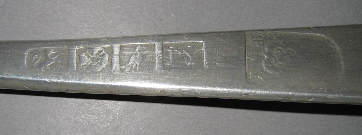 1965.2460 Ladle (marks 2-6)