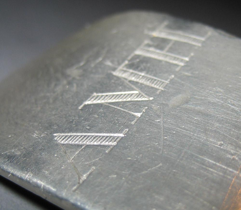 1965.2460 Ladle (inscription)