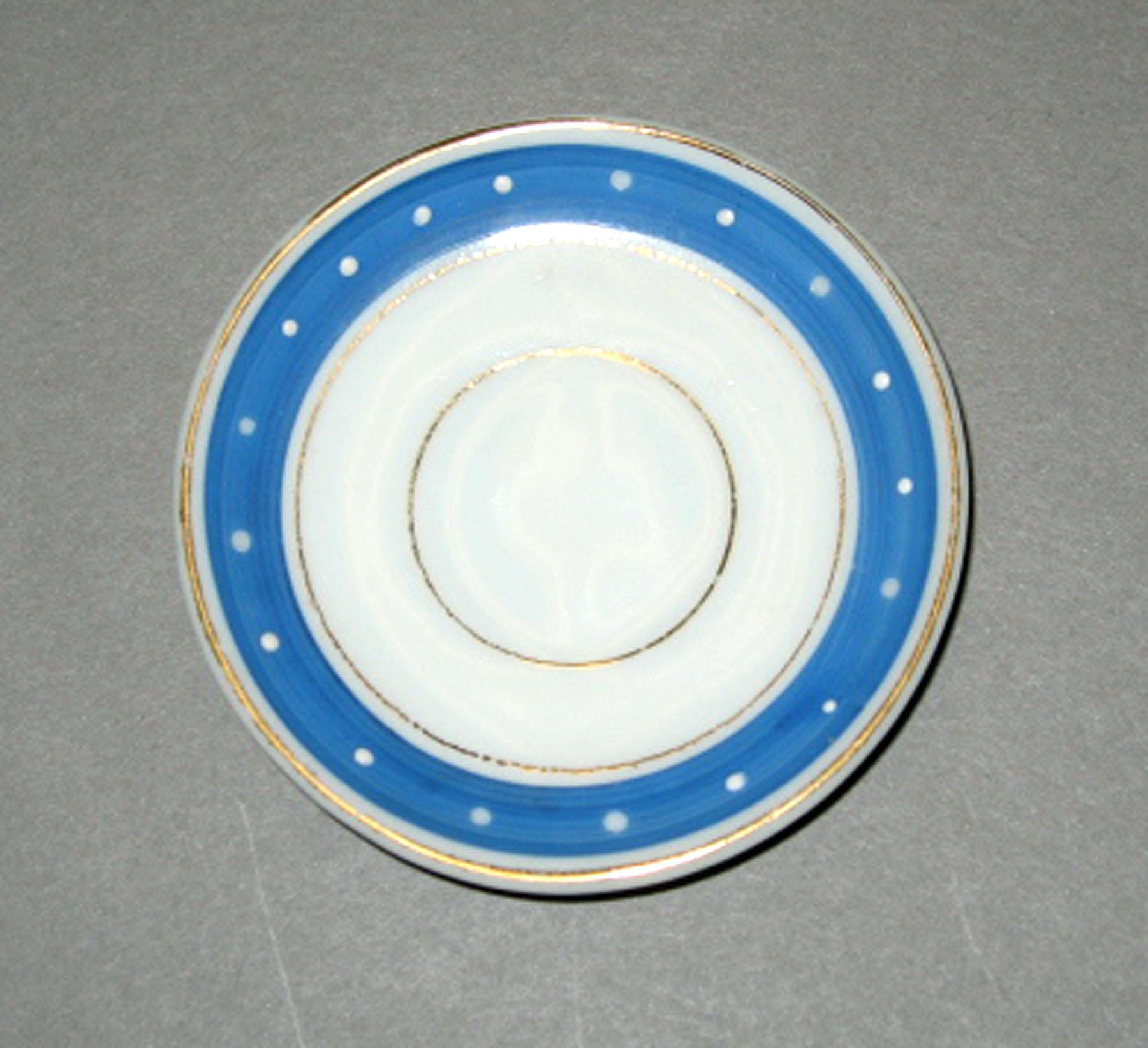 2006.0007.004.011 Miniature porcelain saucer