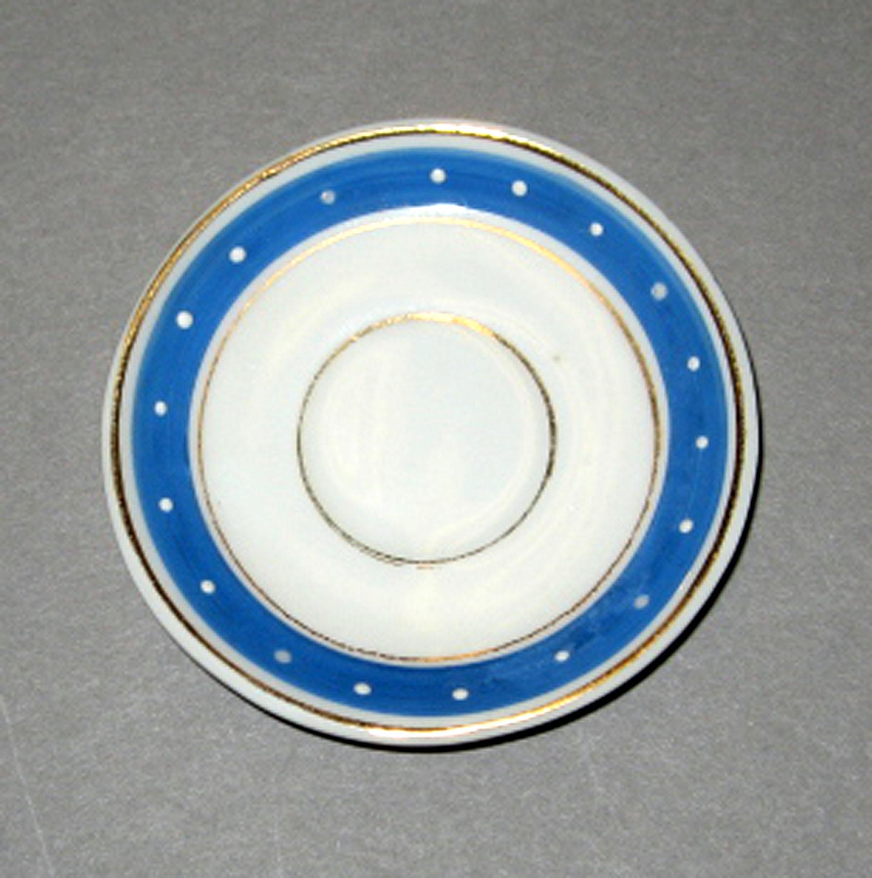 2006.0007.004.013 Miniature porcelain saucer