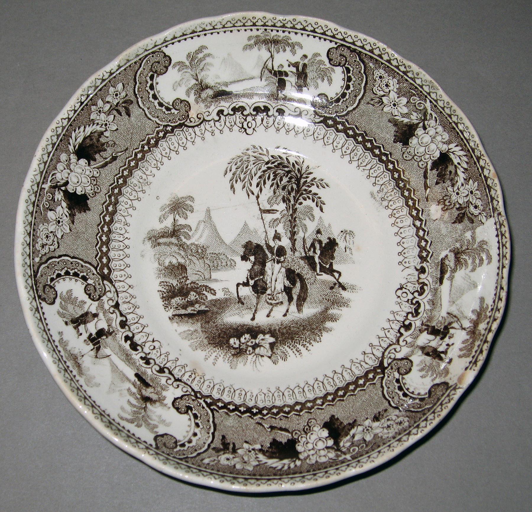 2006.0010.003 B Earthenware saucer