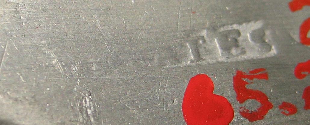 1965.2776 Spoon (mark)