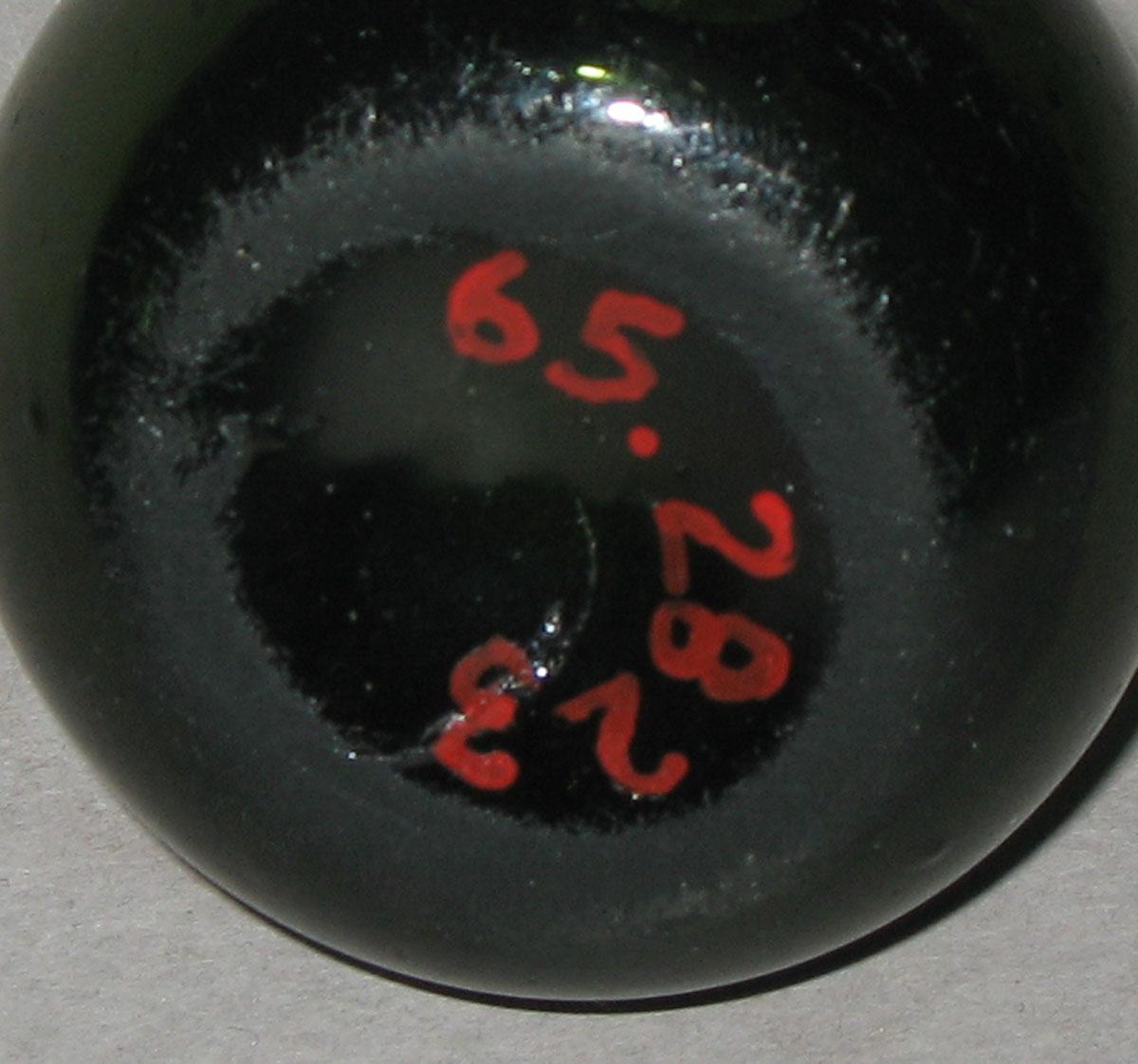 1965.2823 Glass bottle (underside)