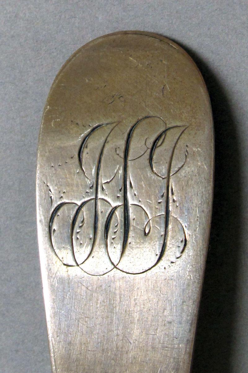1965.3056 Silver spoon engraving