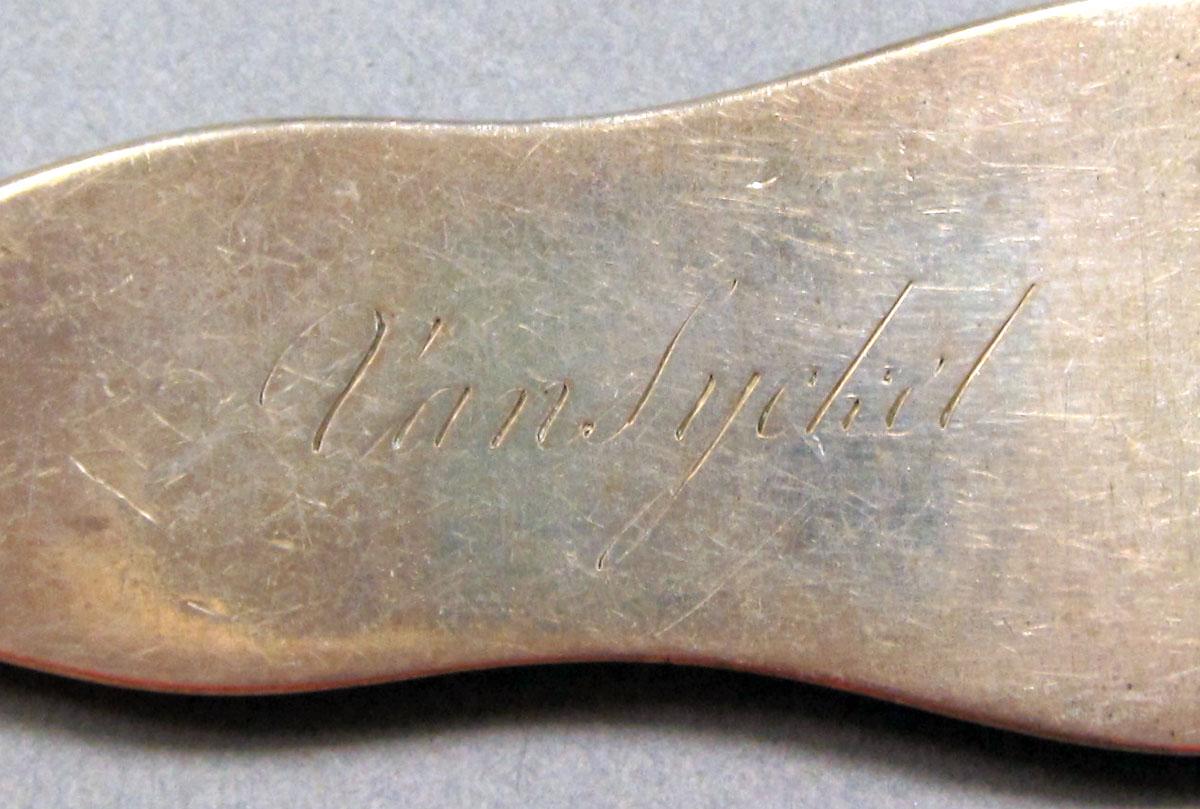 1965.3059 Silver spoon engraving