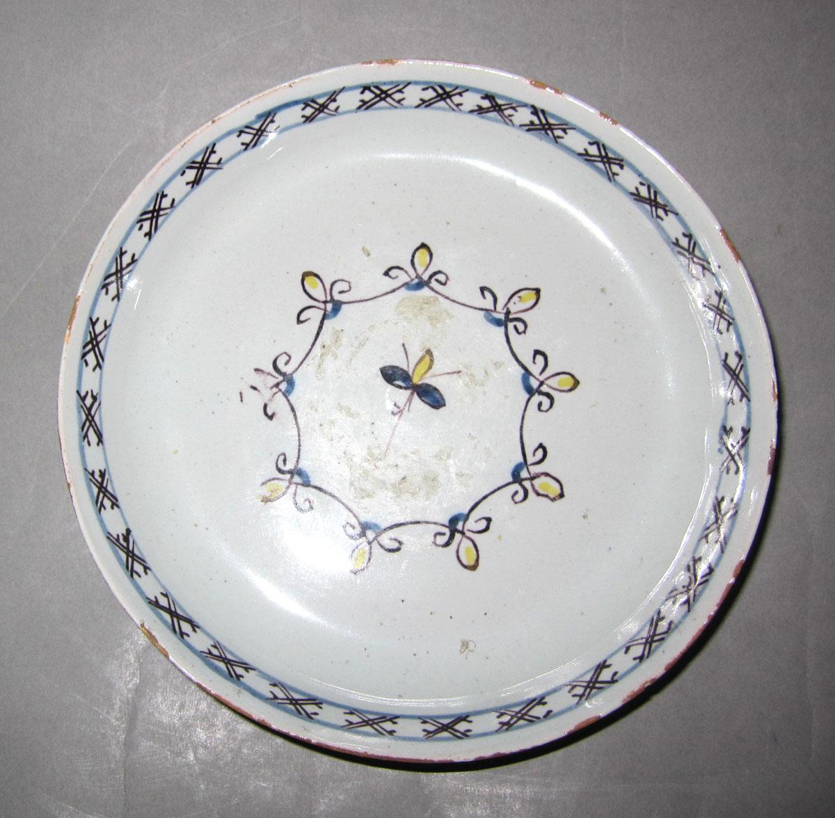 1966.0084 B Earthenware saucer