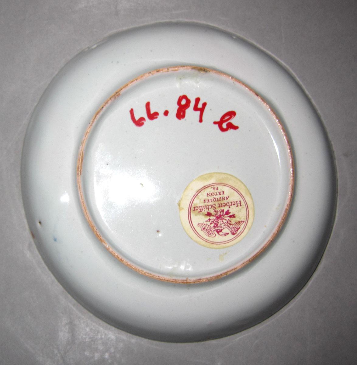 1966.0084 B Earthenware saucer underside
