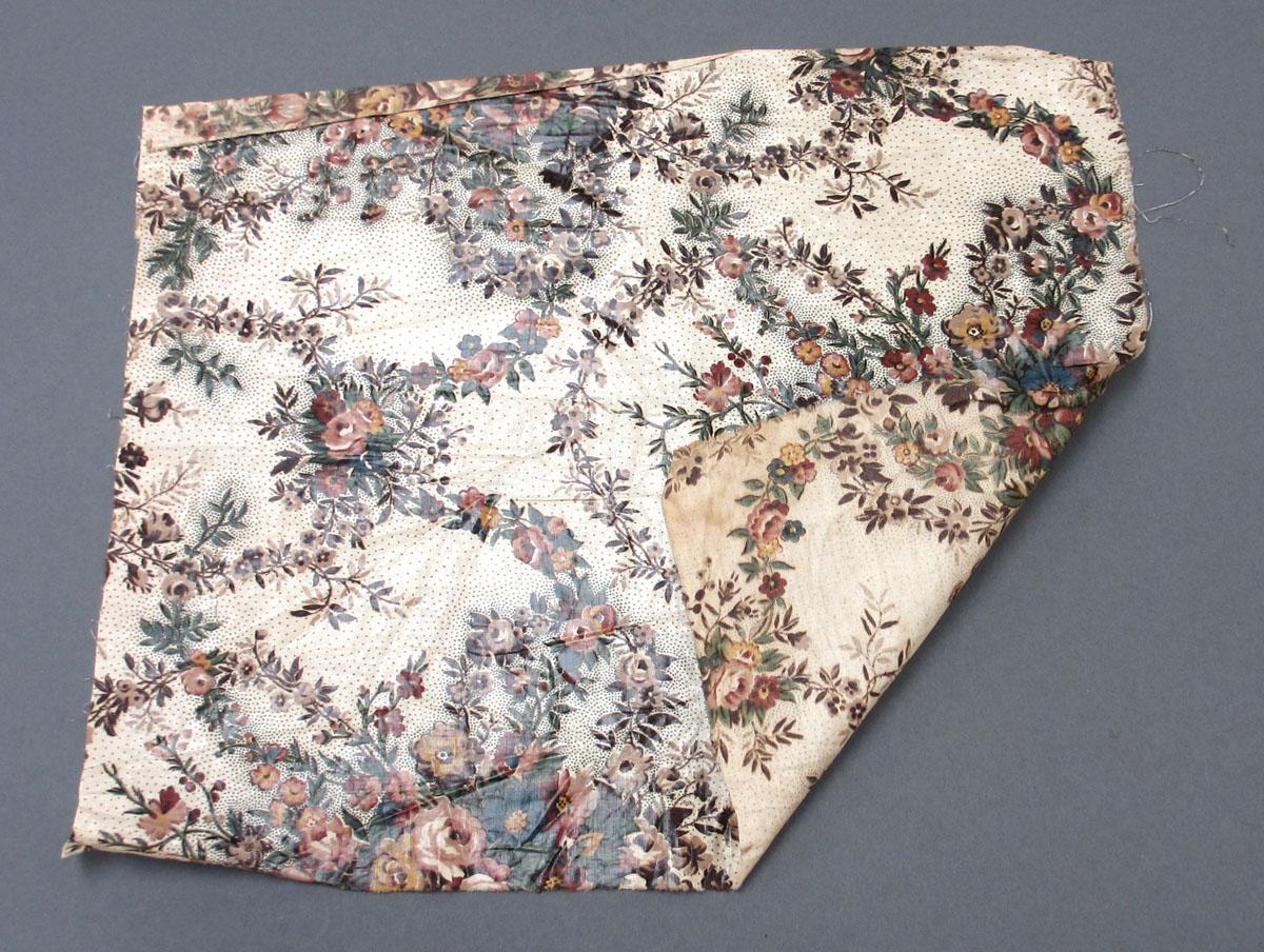 1966.0101 (small on roll) Textile, printed folded corner