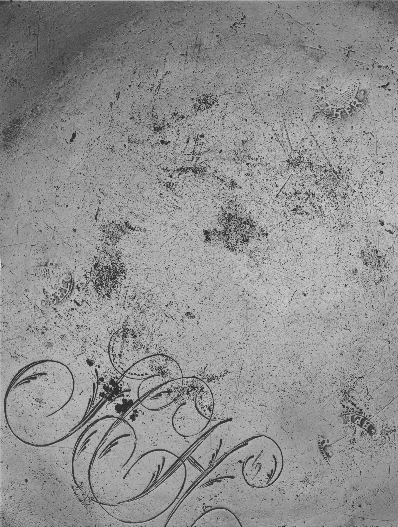 1956.0046.014 Pewter plate (marks)