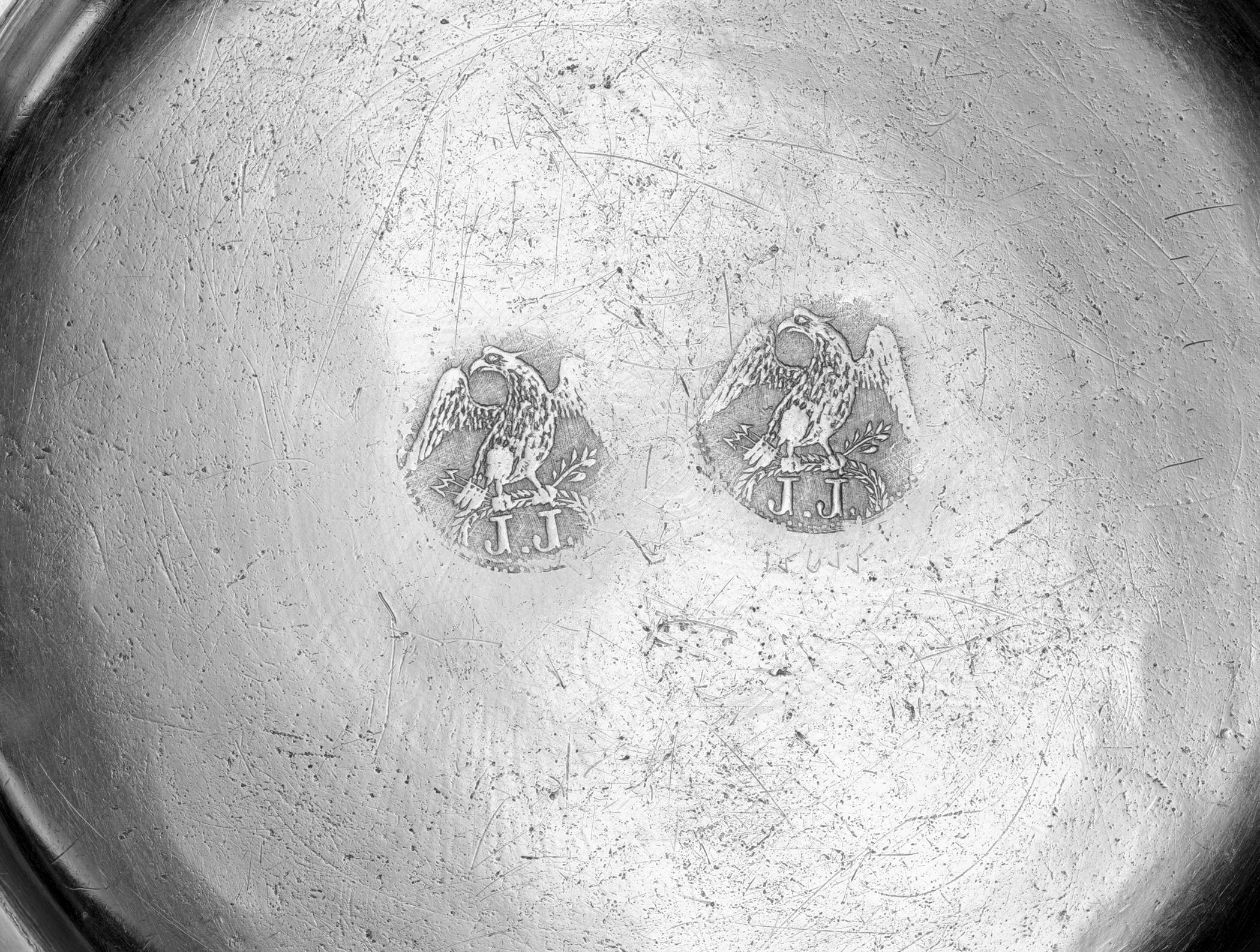 1956.0046.018 Pewter plate (marks)
