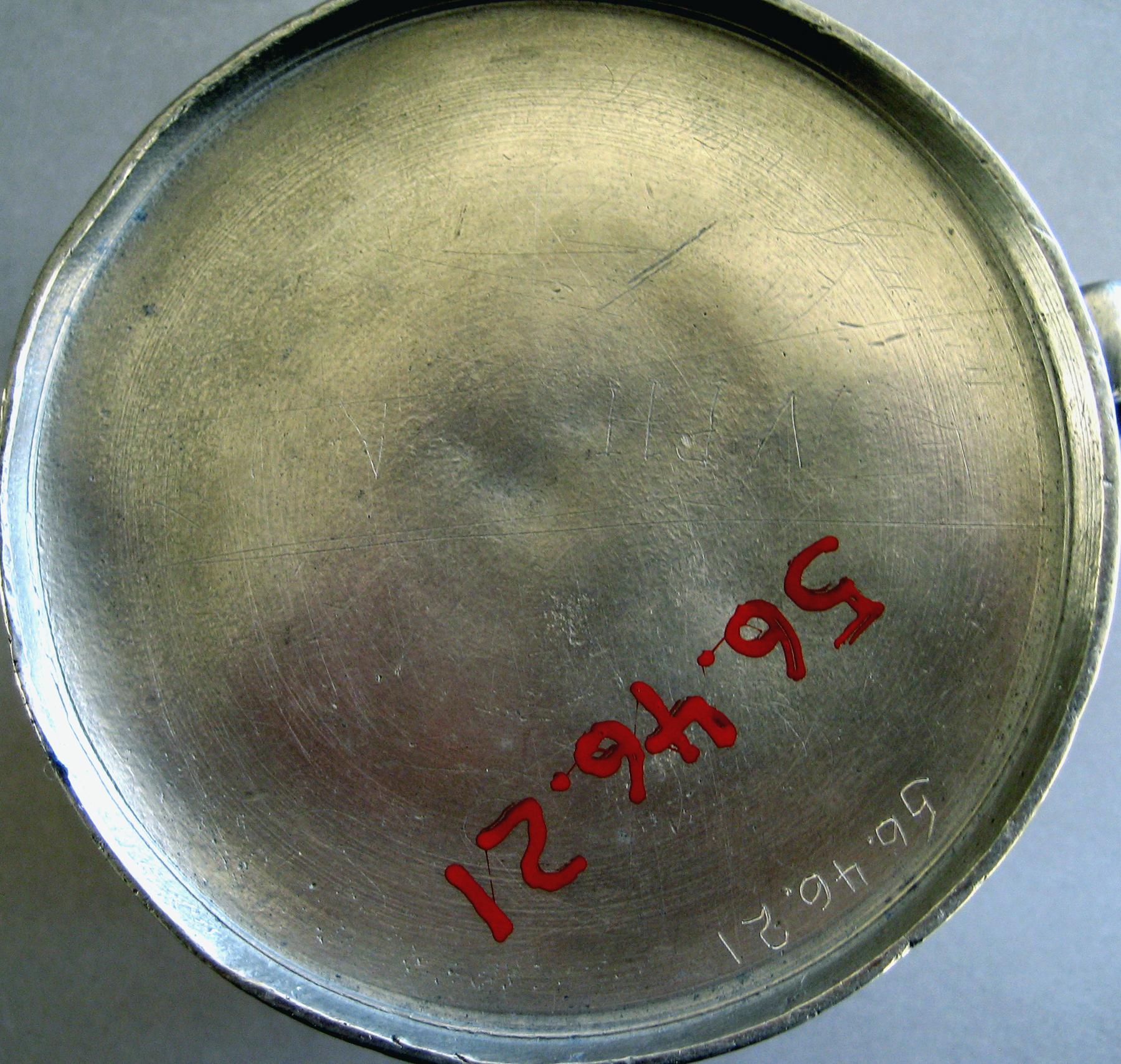 1956.0046.021 Pewter mug (underside)