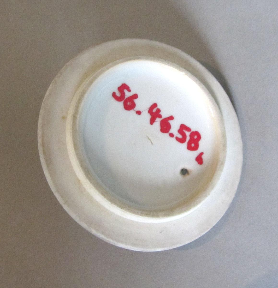 1956.0046.058 B Porcelain teapot cover underside