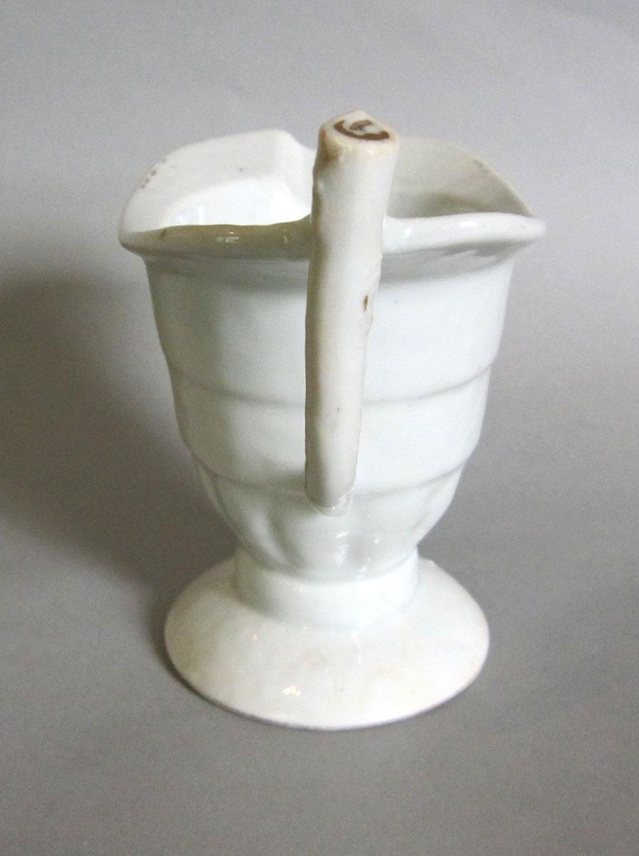 1956.0046.060 Porcelain pot handle