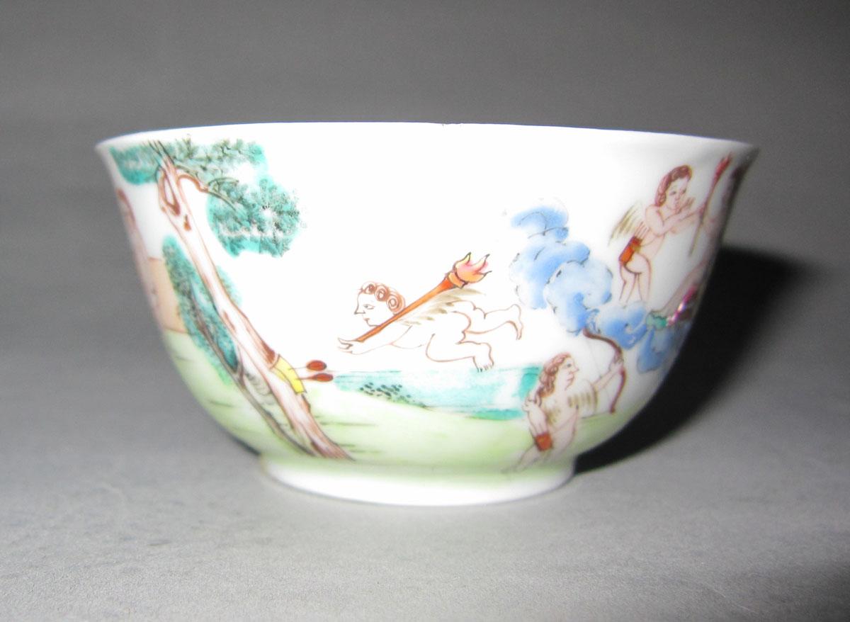 1956.0046.100 A Porcelain teabowl face three
