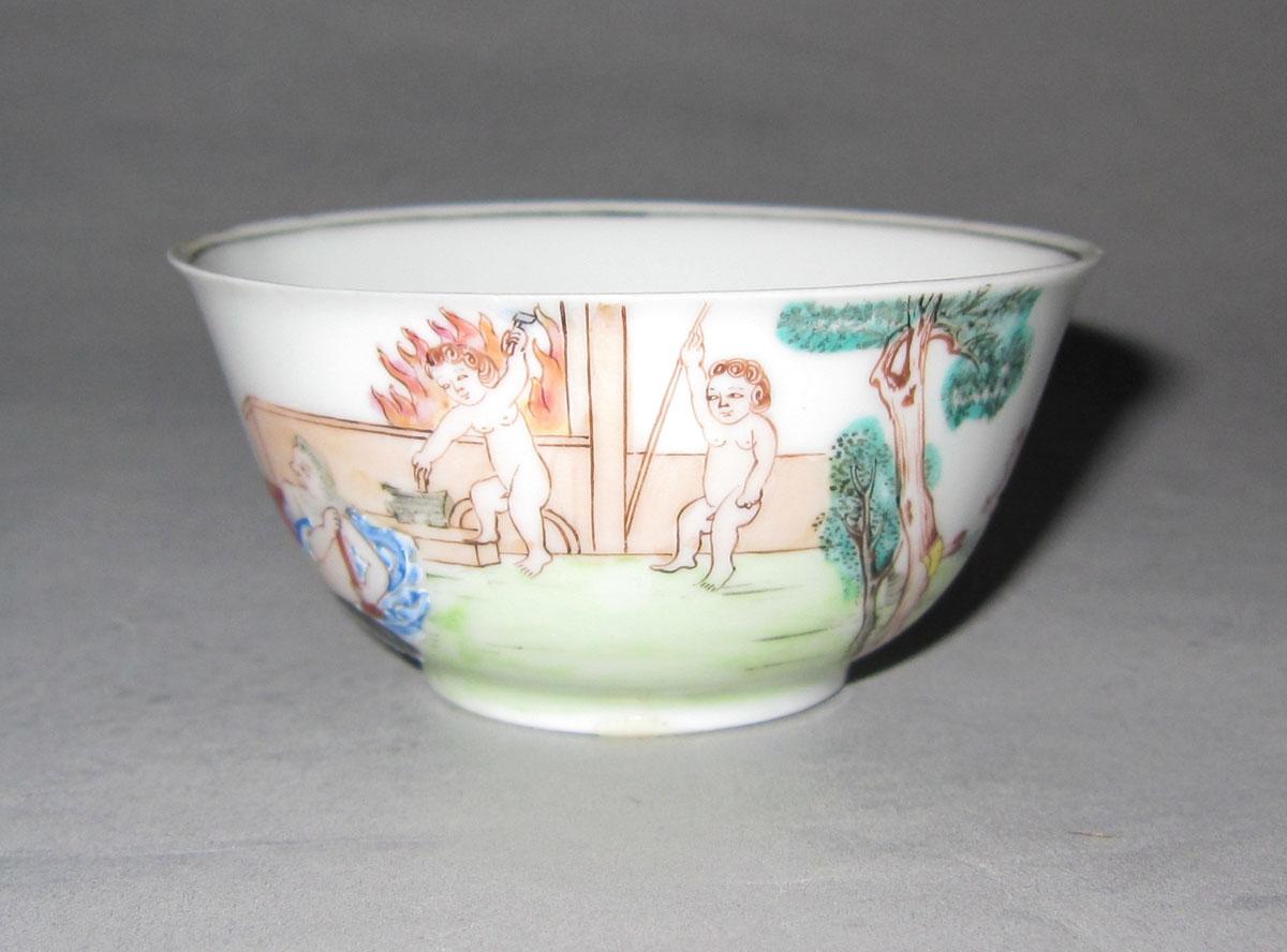 1956.0046.100 A Porcelain teabowl face four