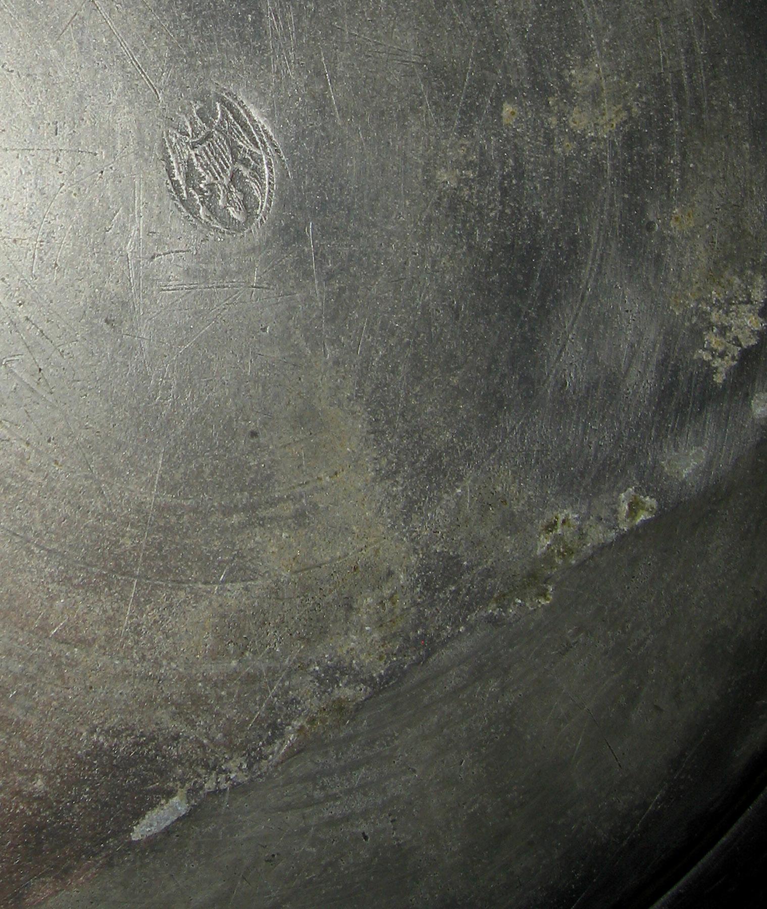 1956.0059.001 Pewter dish (mark and repair)