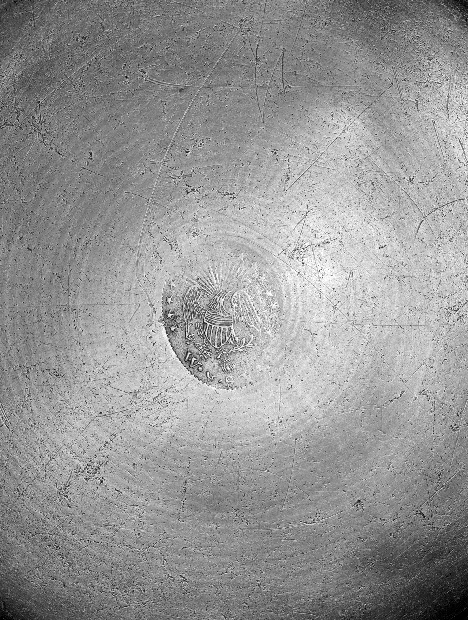 1956.0059.008 Pewter plate (mark)