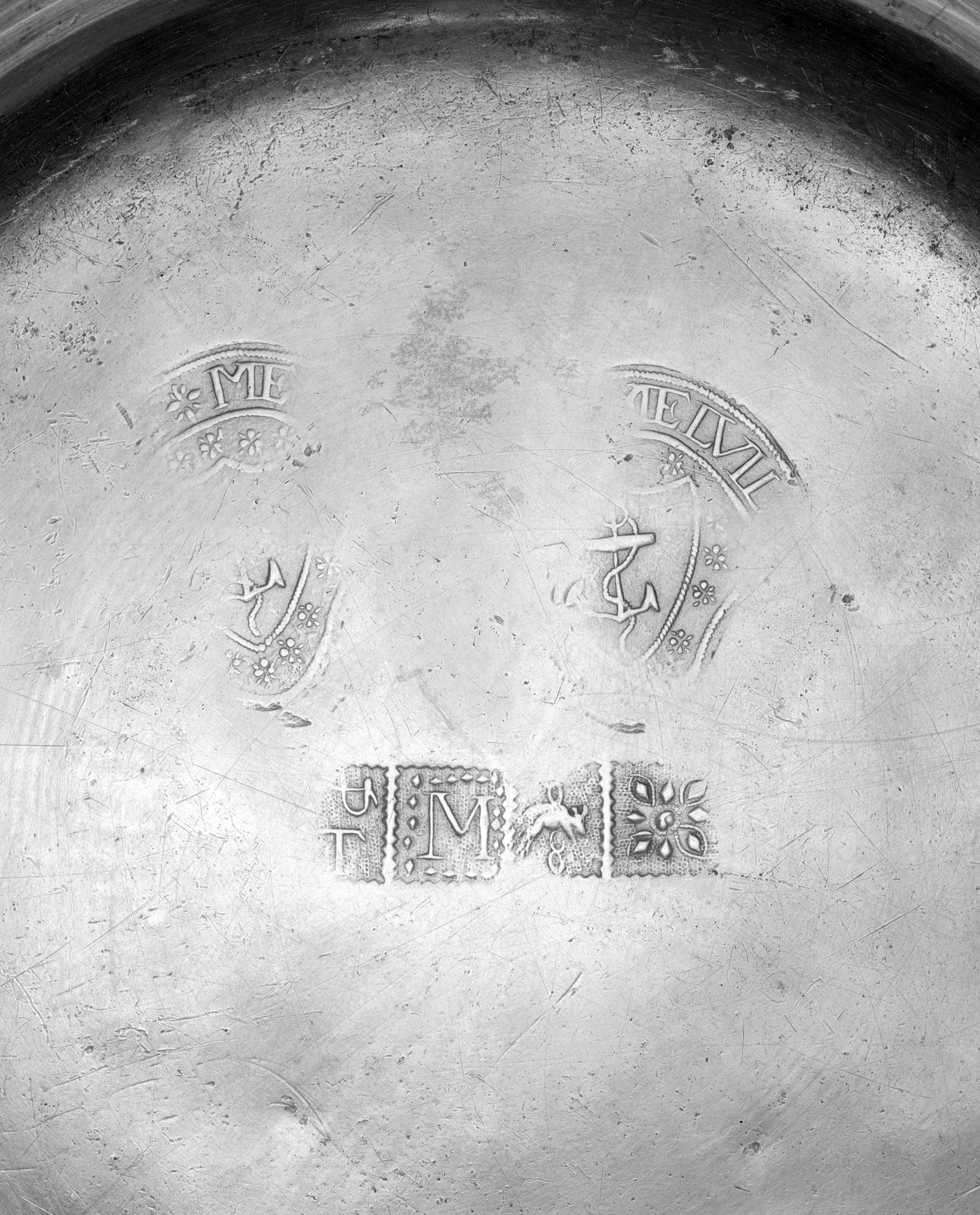 1956.0059.013 Pewter plate (marks)