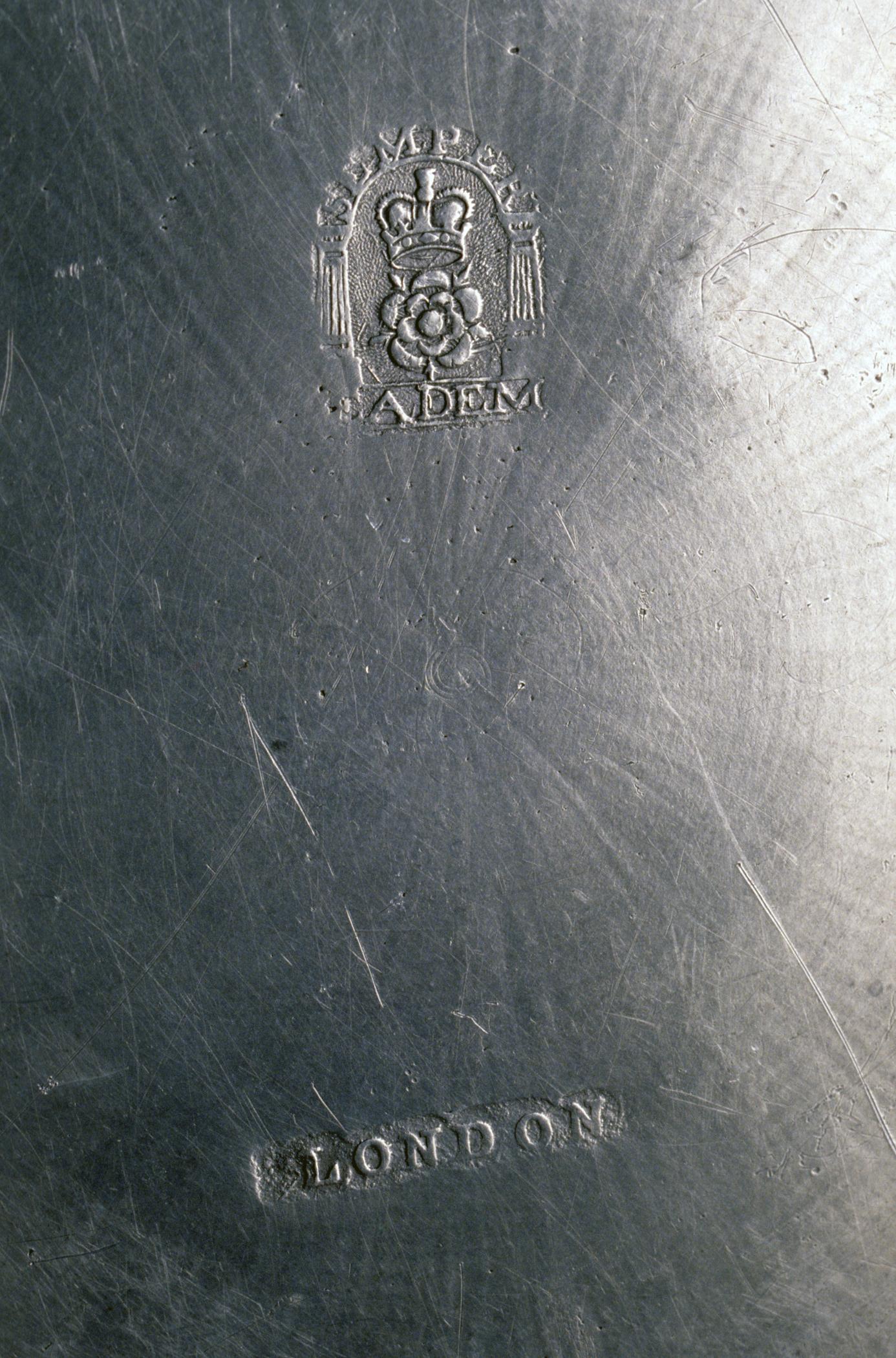 1956.0059.014 Pewter plate (marks)