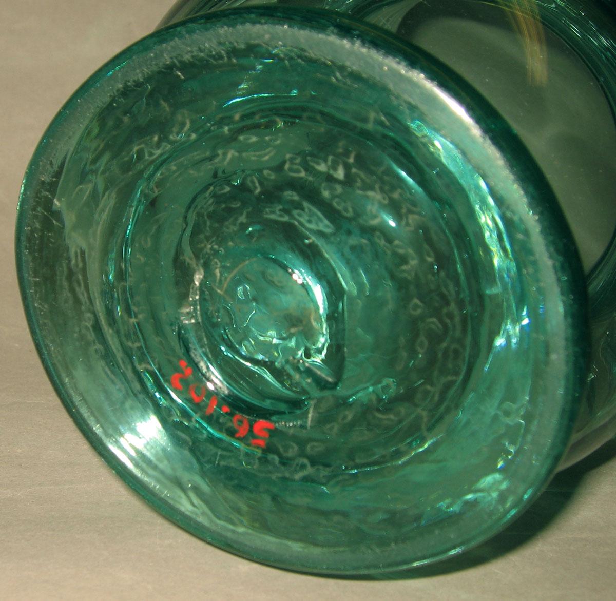 1956.0102 Glass jug (underside)