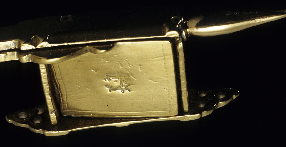 1956.0512 Snuffer detail